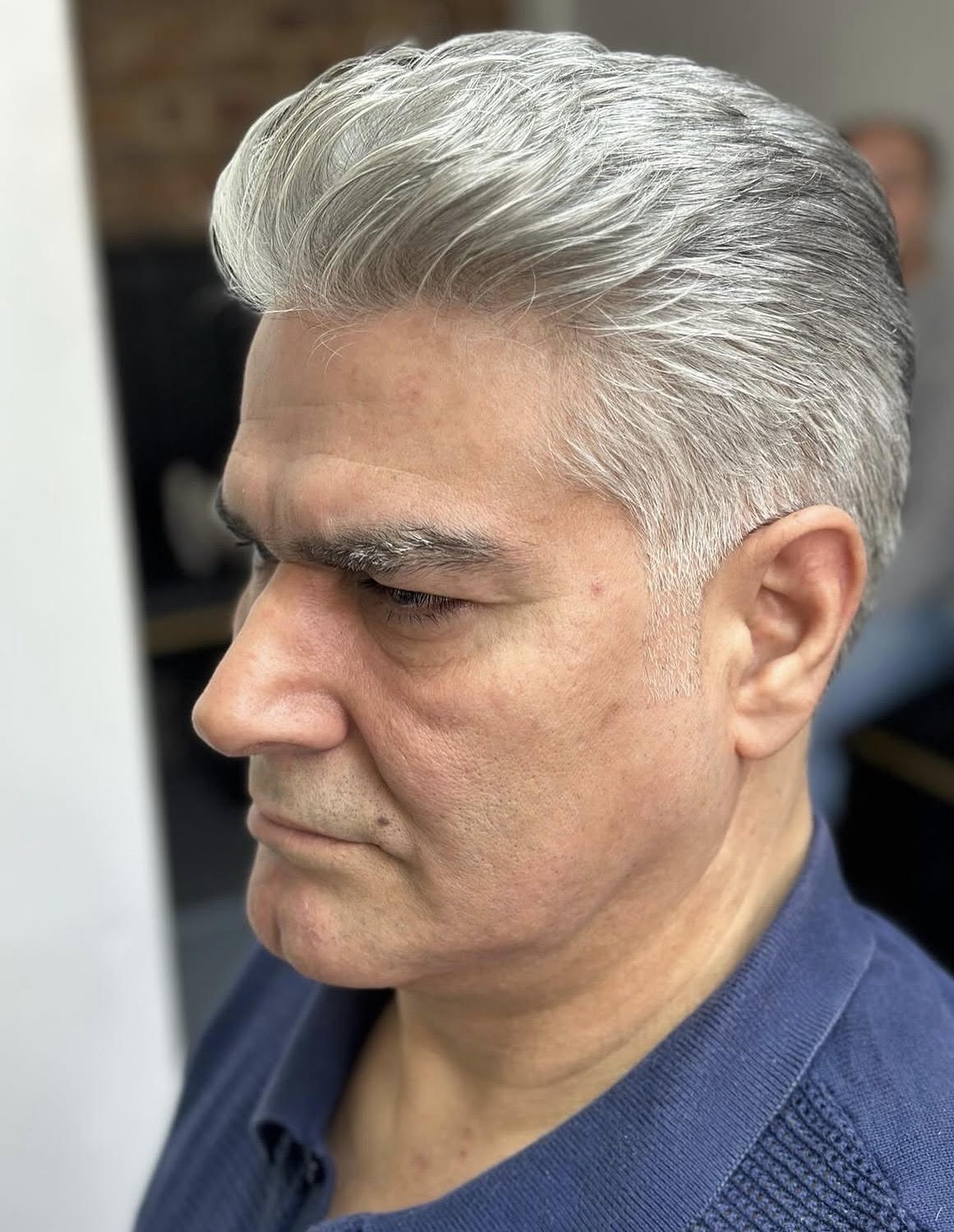 Classic quiff on silver hair, scissor cut and blow dried