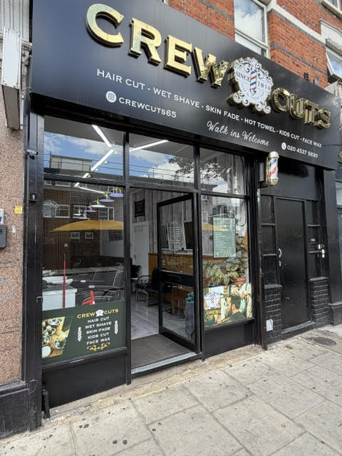 Open door at Crew Cuts, Hackney
